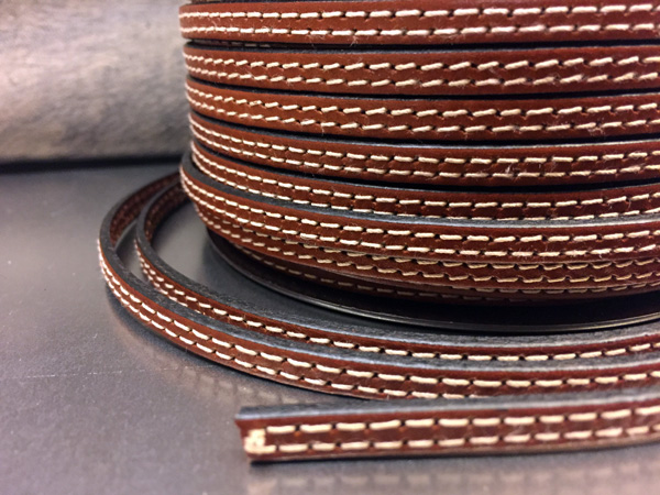STITCHED FLAT LEATHER LACE