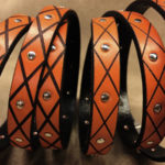 10x2 mm. Orange Flat Leather Lace Engraved and Studded