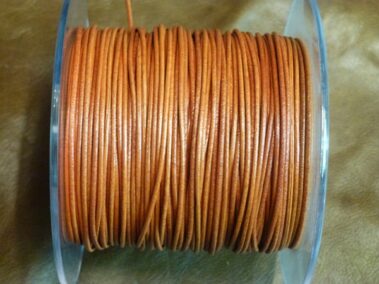 Round Leather Kangaroo 1 mm. diameter, Orange color.