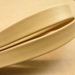 Folded leather strip of 10x2 mm. Ref. TCD 10 color Beige "Premier collection".