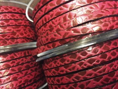 5x2 mm leather strap. red color with giraffe engraving with red transfer.