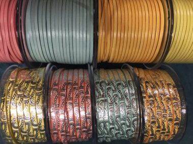 Leather strip of 5x2 mm. Candy colors (yellow, orange, emerald and pink) with engraving Waves with transfer silver shine.