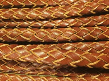 Hand braided leather 10x6 mm Ref. TRO 10x6 brown color unpainted edge