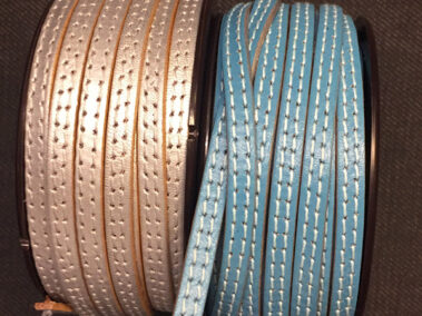 Flat strip with stitching